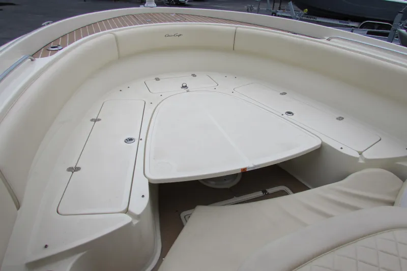  Yacht Photos Pics 2015 Chris-Craft Catalina 29 boat interior with spacious seating and storage compartments.
