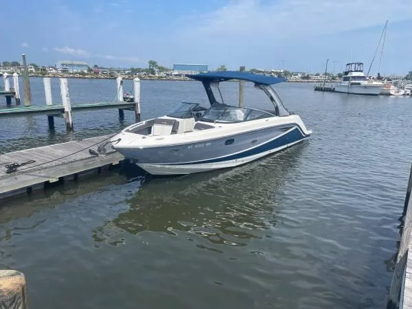  Yacht Photos Pics 2017 Sea Ray SLX 280 boat docked at a marina.