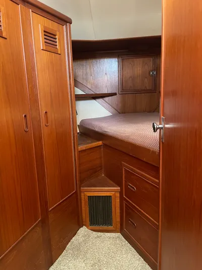 Safe N Sound Yacht Photos Pics 1988 Canoe Cove Tri Cabin interior with wood paneling and cozy sleeping area.