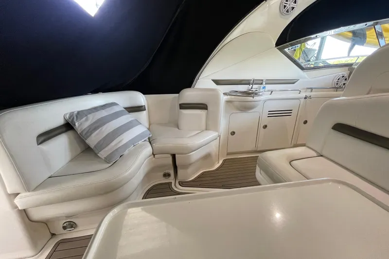  Yacht Photos Pics Luxurious interior of 2007 Sea Ray 38 Sundancer yacht with plush seating and kitchenette.