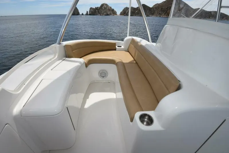 Another Day In Paradise Yacht Photos Pics Luxurious seating area on 2017 Viking 80 Sky Bridge yacht with ocean view.