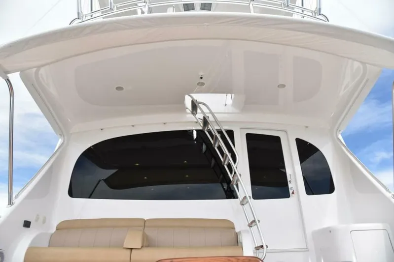 Another Day In Paradise Yacht Photos Pics 2017 Viking 80 Sky Bridge yacht with sleek design and modern seating area.