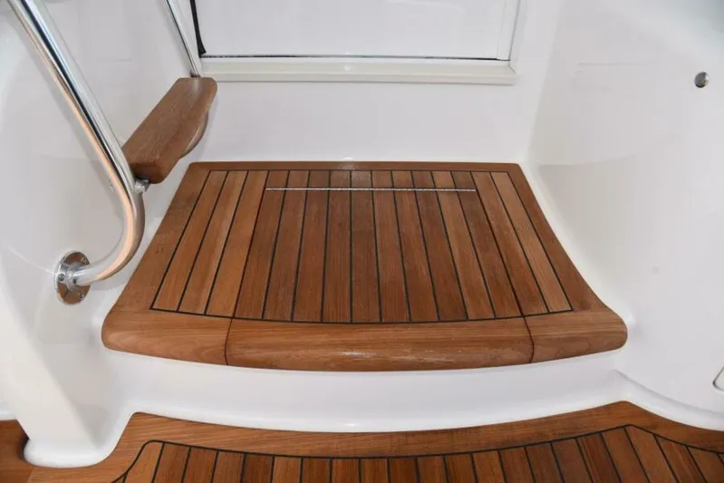 Another Day In Paradise Yacht Photos Pics Teak deck detail on 2017 Viking 80 Sky Bridge yacht.
