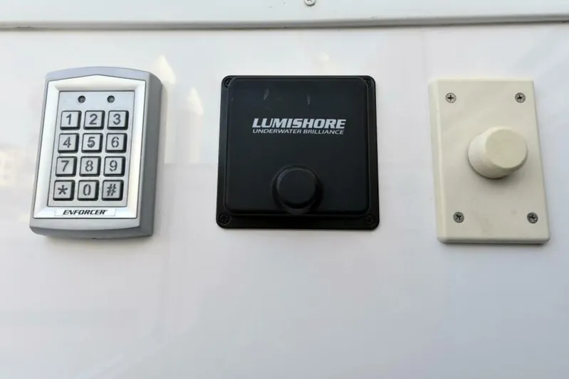 Another Day In Paradise Yacht Photos Pics Keypad, Lumishore control, and switch on 2017 Viking 80 Sky Bridge yacht.