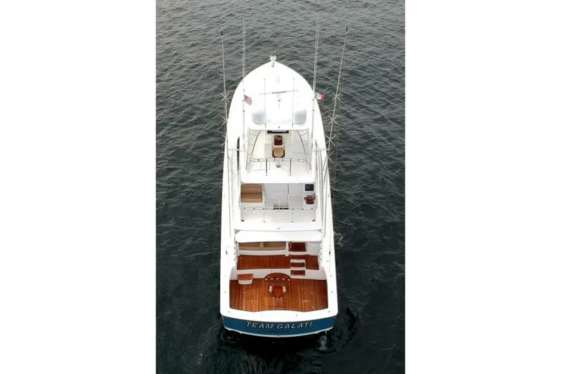 Another Day In Paradise Yacht Photos Pics Aerial view of 2017 Viking 80 Sky Bridge yacht on open water.