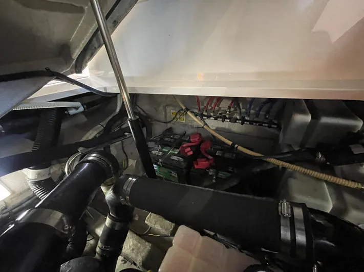  Yacht Photos Pics Engine compartment of a 2007 Sea Ray 38 Sundancer boat showing batteries and wiring.