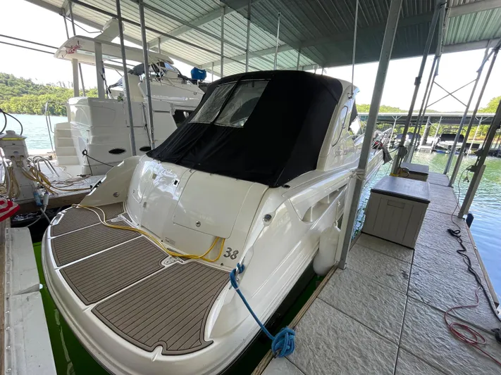  Yacht Photos Pics 2007 Sea Ray 38 Sundancer docked in a covered marina.