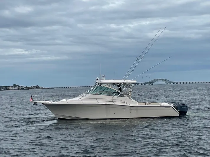  Yacht Photos Pics 2007 Grady-White Express 360 boat on open water under cloudy skies.