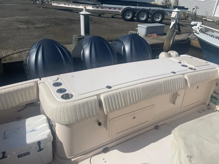  Yacht Photos Pics 2007 Grady-White Express 360 boat with triple outboard engines docked at marina.
