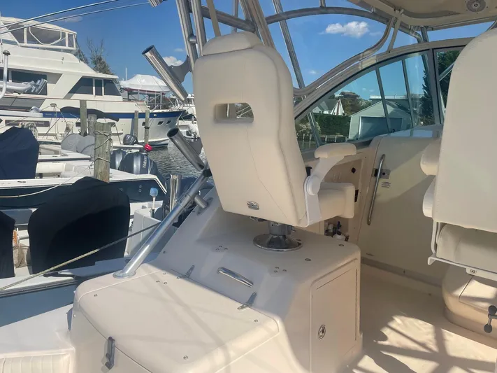  Yacht Photos Pics 2007 Grady-White Express 360 boat interior with helm seating and marina view.