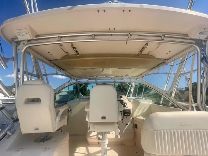  Yacht Photos Pics 2007 Grady-White Express 360 boat interior with helm and seating area.