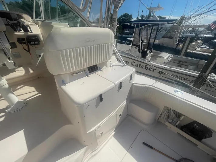  Yacht Photos Pics 2007 Grady-White Express 360 boat interior with seating and helm, docked at marina.