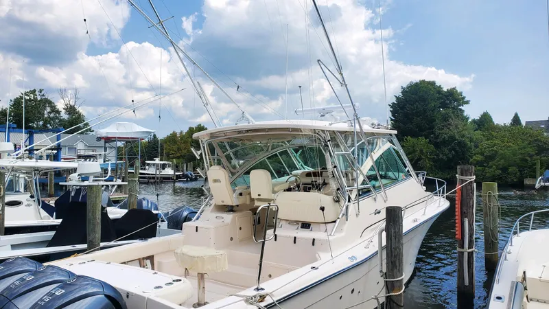  Yacht Photos Pics 2007 Grady-White Express 360 boat docked at a marina under a cloudy sky.