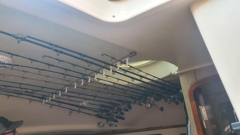  Yacht Photos Pics Interior view of 2007 Grady-White Express 360 with fishing rods stored on the ceiling.