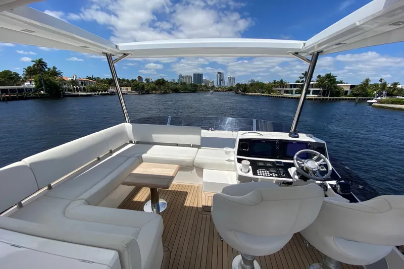 Gaia Yacht Photos Pics Luxurious 2017 Sunseeker Manhattan 52 yacht interior with scenic waterfront view.