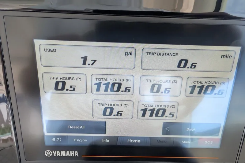Nothing But Fine Yacht Photos Pics Display screen of a 2022 Pursuit OS 385 Offshore showing trip and fuel data.