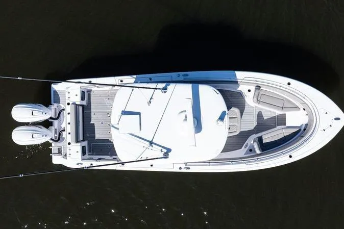  Yacht Photos Pics 2024 Sportsman Open 322 Center Console boat, aerial view, dual engines, sleek design.