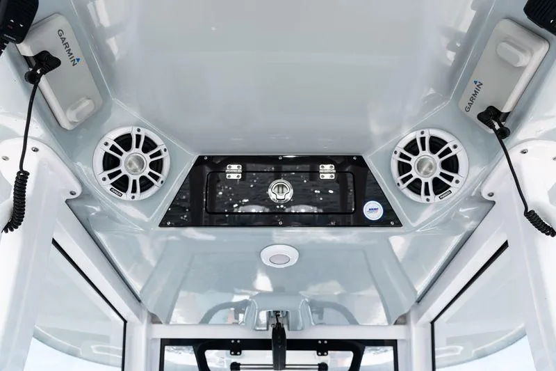  Yacht Photos Pics 2024 Sportsman Open 322 Center Console boat interior with Garmin electronics and speakers.