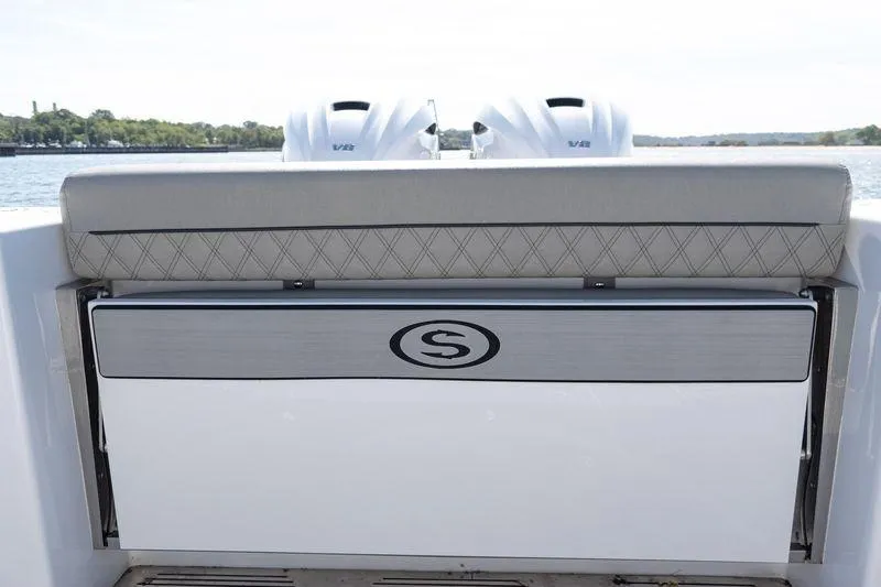  Yacht Photos Pics 2024 Sportsman Open 322 Center Console boat with dual engines, rear seating, and sleek design.