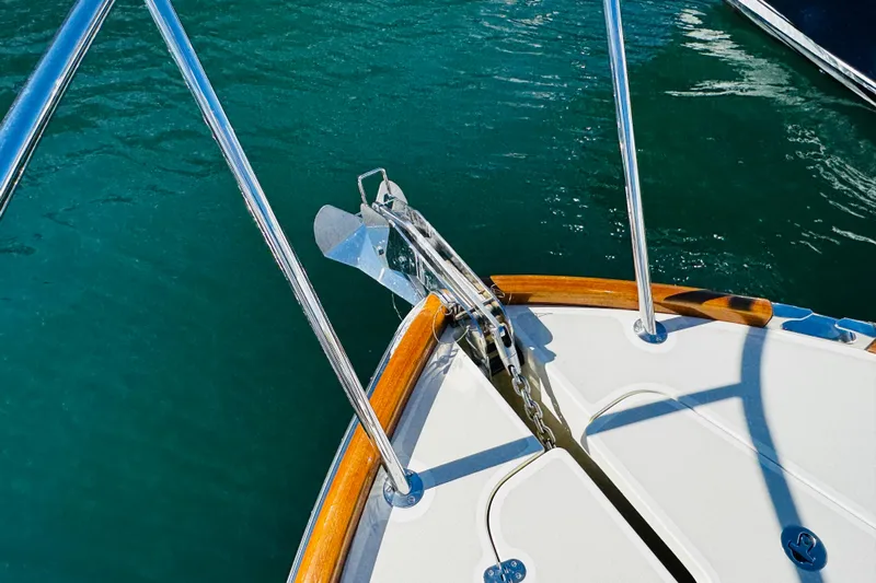 Maverick Yacht Photos Pics Bow of 2012 Hinckley Picnic Boat MKIII with anchor and teak accents.