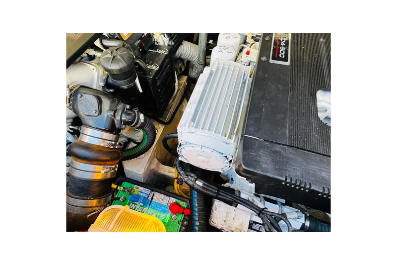 Maverick Yacht Photos Pics Engine compartment of a 2012 Hinckley Picnic Boat MKIII, showcasing mechanical components.