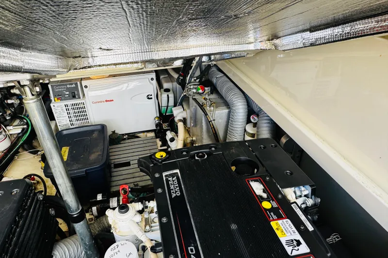 Maverick Yacht Photos Pics Engine room of 2012 Hinckley Picnic Boat MKIII with Cummins Onan generator and Yanmar engine.