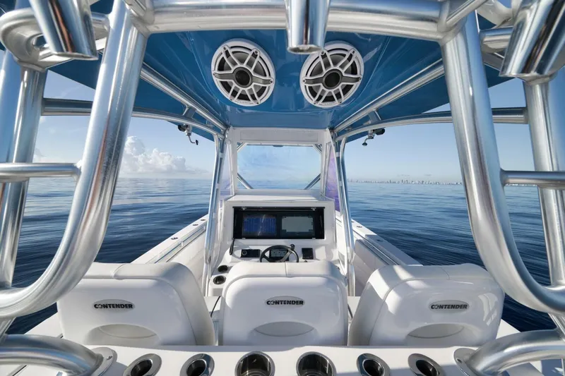Top Shelf Too Yacht Photos Pics 2023 Contender 39 ST boat interior with advanced navigation system and ocean view.