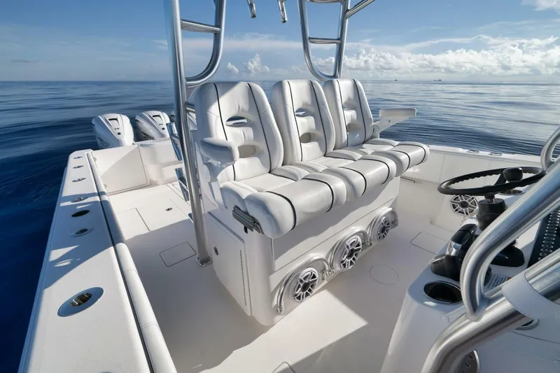 Top Shelf Too Yacht Photos Pics 2023 Contender 39 ST boat interior with luxurious seating and ocean view.