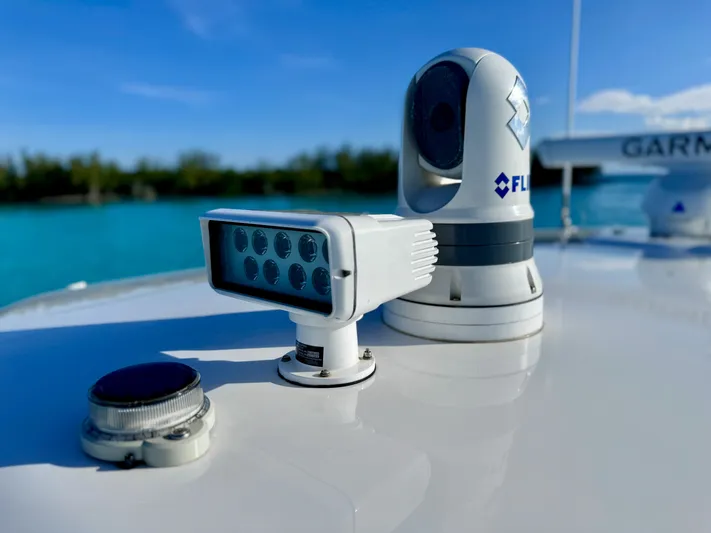  Yacht Photos Pics 2023 Intrepid 427 Nomad SE boat with advanced navigation equipment on deck.