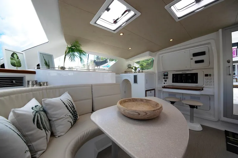 Moonstruck Yacht Photos Pics Luxurious interior of 2018 Voyage Yachts VOYAGE 480 with modern seating and decor.