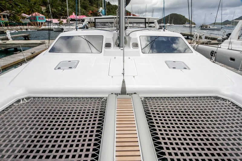 Moonstruck Yacht Photos Pics 2018 Voyage Yachts VOYAGE 480 catamaran docked in scenic marina setting.