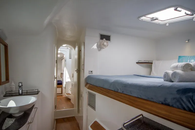 Moonstruck Yacht Photos Pics Luxurious interior of 2018 Voyage Yachts VOYAGE 480, featuring a cozy cabin and modern amenities.