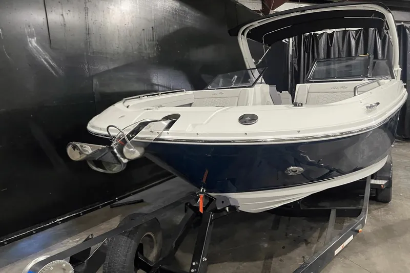  Yacht Photos Pics 2024 Sea Ray SDX 290 boat on trailer in indoor storage.