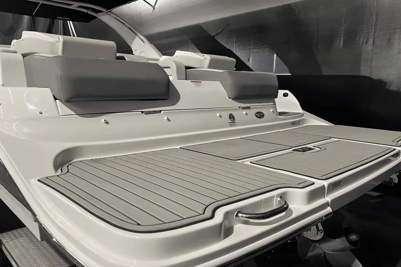  Yacht Photos Pics 2024 Sea Ray SDX 290 boat with spacious rear deck and cushioned seating.