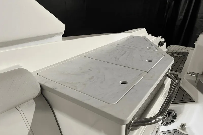  Yacht Photos Pics 2024 Sea Ray SDX 290 boat interior with sleek white seating and modern design features.