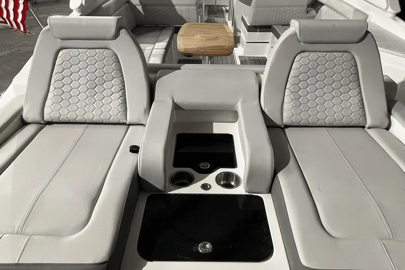  Yacht Photos Pics 2024 Sea Ray SDX 290 boat interior with luxurious seating and modern design.