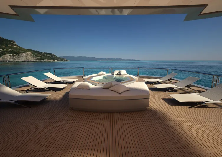 Project Metaverse Yacht Photos Pics Luxury deck of Delta Gregory C Marshall 63m NFT yacht, 2027, with sun loungers and ocean view.