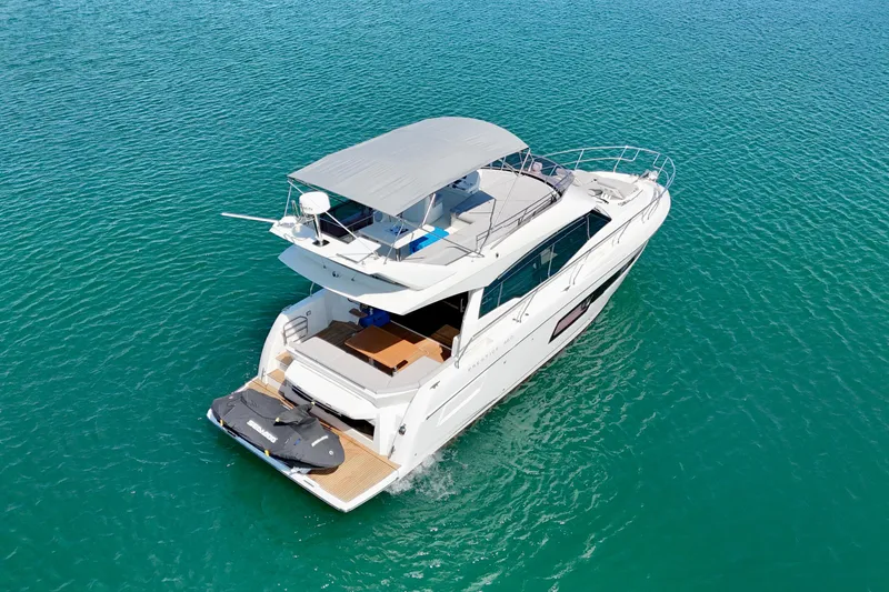  Yacht Photos Pics 2023 Prestige 460 yacht on clear blue water, aerial view.