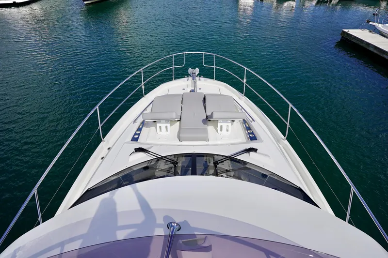  Yacht Photos Pics Prestige 460 yacht 2023 model, view from bow, docked in marina.