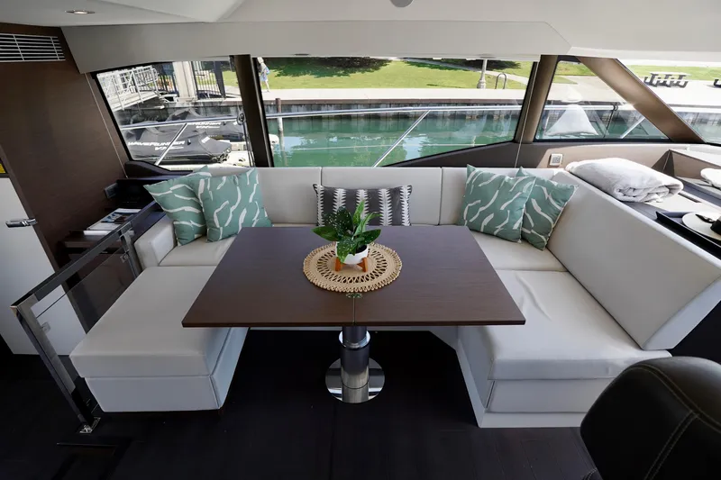  Yacht Photos Pics Luxurious interior of 2023 Prestige 460 yacht with elegant seating and decor.
