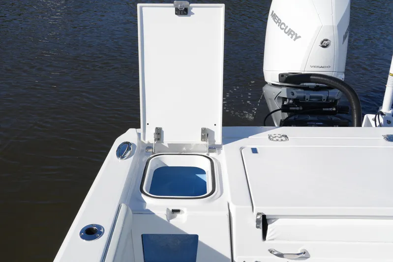Your Next Boat! Yacht Photos Pics 2026 Blackfin 242 HB boat with open hatch and Mercury Verado engine.