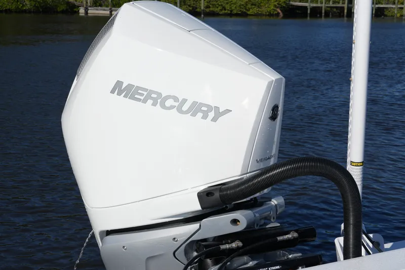 Your Next Boat! Yacht Photos Pics 2026 Blackfin 242 HB with Mercury Verado outboard engine on water.