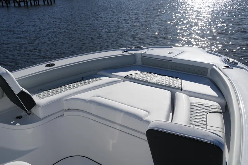 Your Next Boat! Yacht Photos Pics Luxurious seating on 2026 Blackfin 242 HB boat, with sparkling water backdrop.
