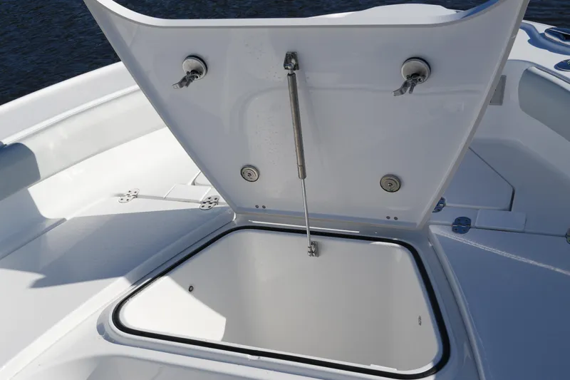 Your Next Boat! Yacht Photos Pics Open storage compartment on 2026 Blackfin 242 HB boat, showcasing interior space.