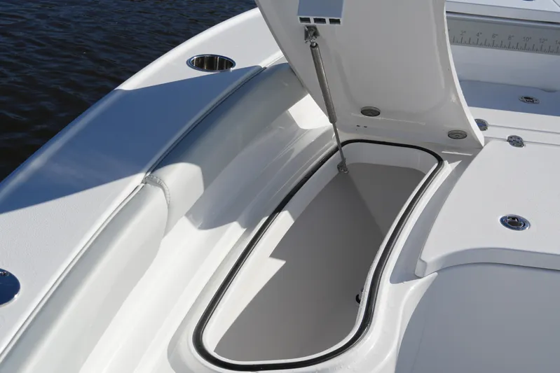 Your Next Boat! Yacht Photos Pics Open storage compartment on 2026 Blackfin 242 HB boat, showcasing sleek design and functionality.