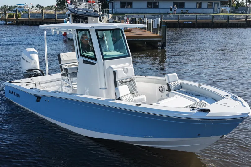 Your Next Boat! Yacht Photos Pics 2026 Blackfin 242 HB boat on water, featuring sleek design and modern amenities.