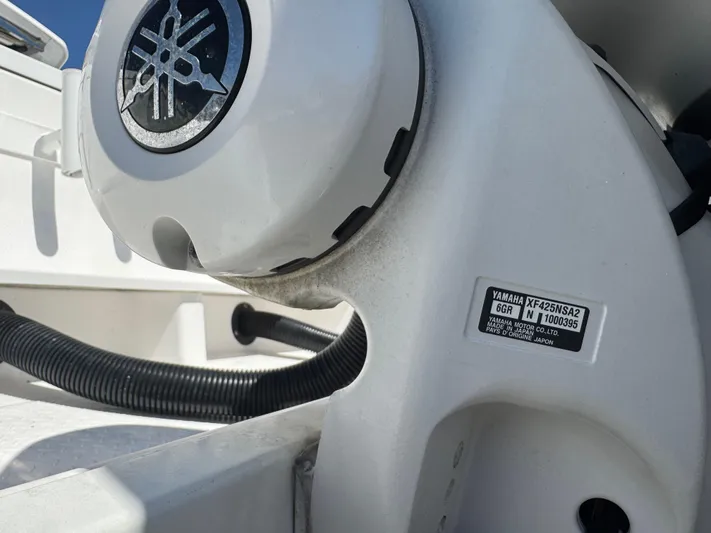  Yacht Photos Pics Close-up of Yamaha engine part on 2019 Everglades 340 Dual Console boat.