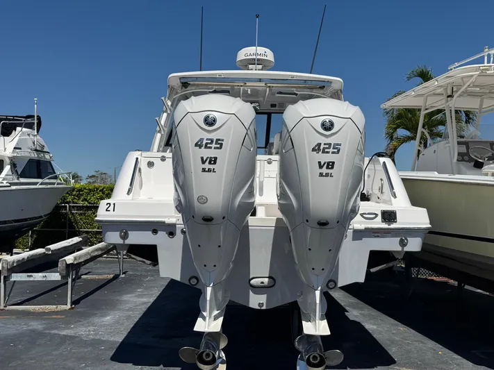  Yacht Photos Pics 2019 Everglades 340 Dual Console boat with twin 425 V8 engines, docked outdoors.
