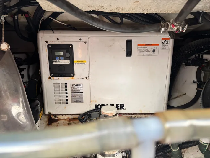  Yacht Photos Pics Kohler generator in 2019 Everglades 340 Dual Console boat engine compartment.
