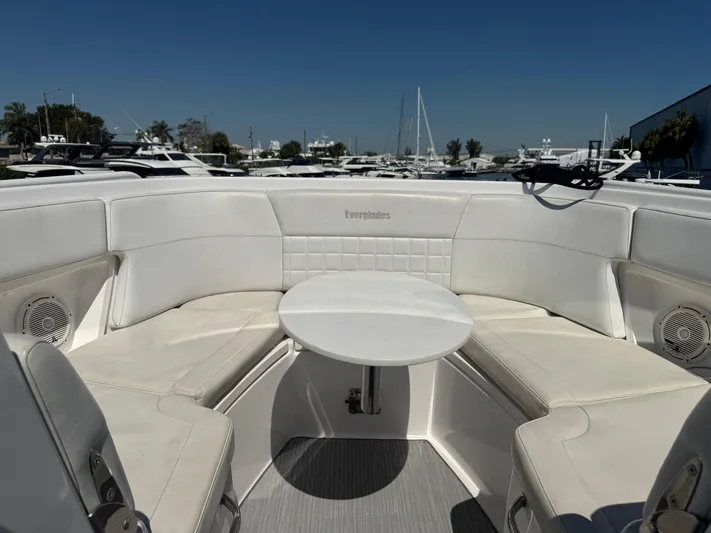  Yacht Photos Pics 2019 Everglades 340 Dual Console boat interior with white seating and table.